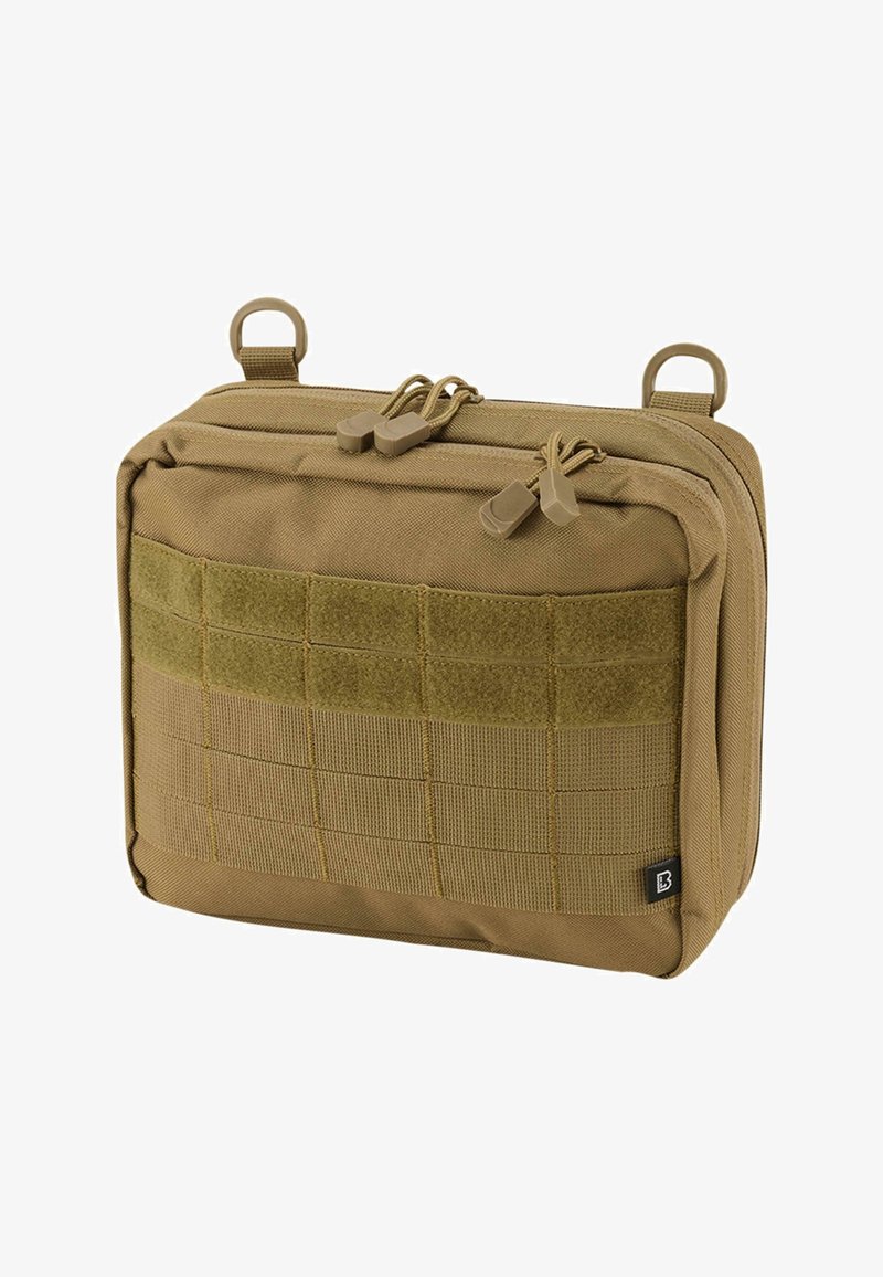 Taktisk påse med en tan-färgad tygutsida, utrustad med en texturerad panel med webbmaterial och Velcro-detaljer. Dubbel dragkedjestängning med dragband.