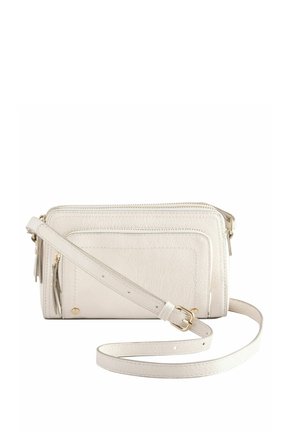 White leather crossbody bag with a textured finish, featuring two zippered compartments, an adjustable strap, and gold-tone hardware accents.
