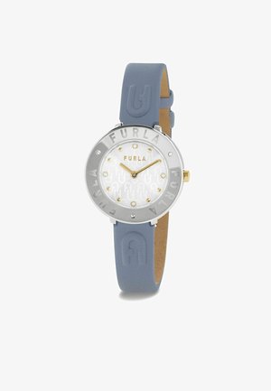 Silberfarbene Uhr mit einem glänzenden weißen Zifferblatt, goldenen Akzenten und einem hellblauen Silikonarmband. Verfügt über Gravuren und Kristallmarkierungen.
