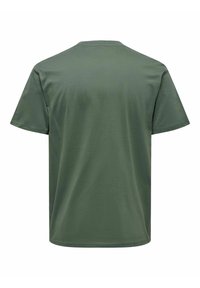 Olive green cotton t-shirt with a crew neckline, short sleeves, and a relaxed fit. Smooth texture and plain design.