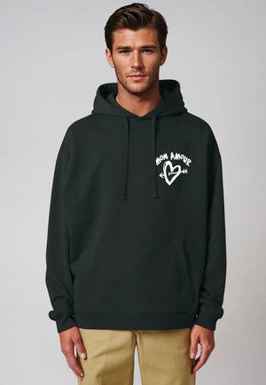 Dark green hoodie with a front pocket, featuring a white graphic that reads "Mon Amour" in a casual font. Includes a drawstring hood.