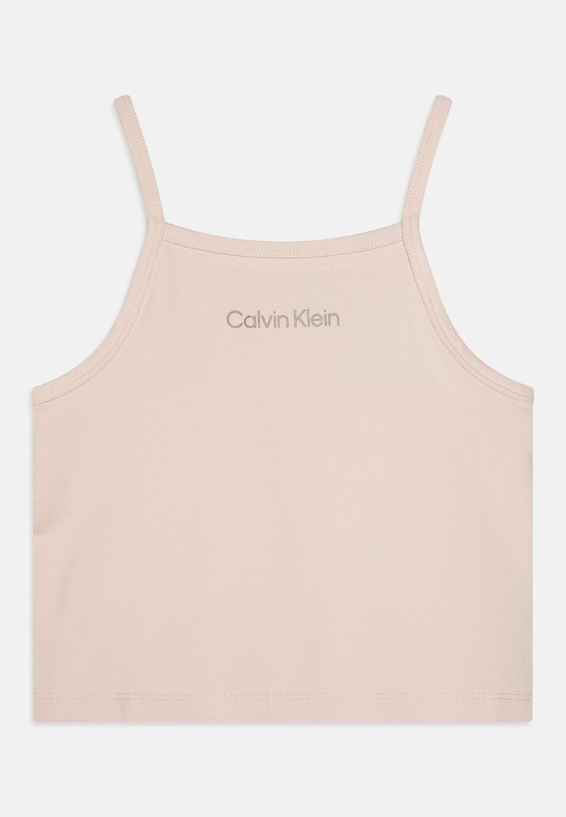 Világos rózsaszín pamut crop top vékony pántokkal, a hátsó részén diszkrét Calvin Klein logóval. Sima textúra és egyszerű dizájn.