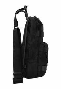 Borsa a tracolla nera con tessuto testurizzato, tasca frontale con zip, tracolla regolabile e due chiusure laterali. Design compatto ideale per trasportare gli essenziali.