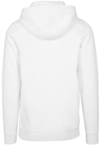 Balts kapuci krekls, izgatavots no viendabīgas auduma. Iespējojot kangaroo kabatu un ribotas piedurknes. Gluda tekstūra ar vienkāršu, bez rotājumu dizainu.