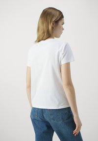 Levi's® Marškinėliai su spaudiniu - bright white