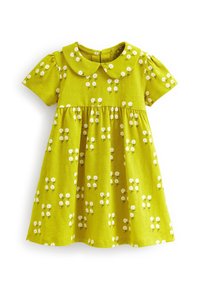 Vestito per bambina a maniche corte giallo-verde con stampa floreale bianca, colletto rotondo stile Peter Pan, vita arricciata e chiusura con zip sul retro.