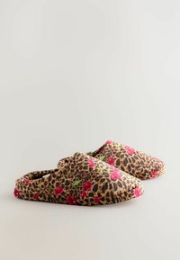 Leopard-print slippers with red floral accents, made from soft fabric. Rounded toe design with a slip-on style for easy wear.