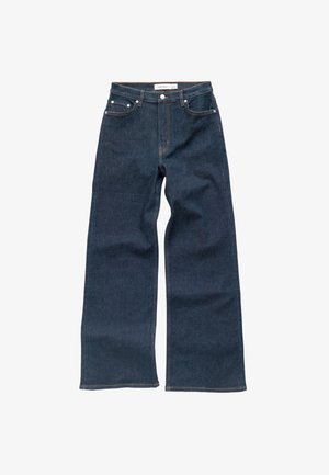 Tumedatest siniste denimi püksid laia säärega, tavalise luku, viie tasku ja kontrastõmblustega. Sile tekstuur, minimaalne viimistlus.