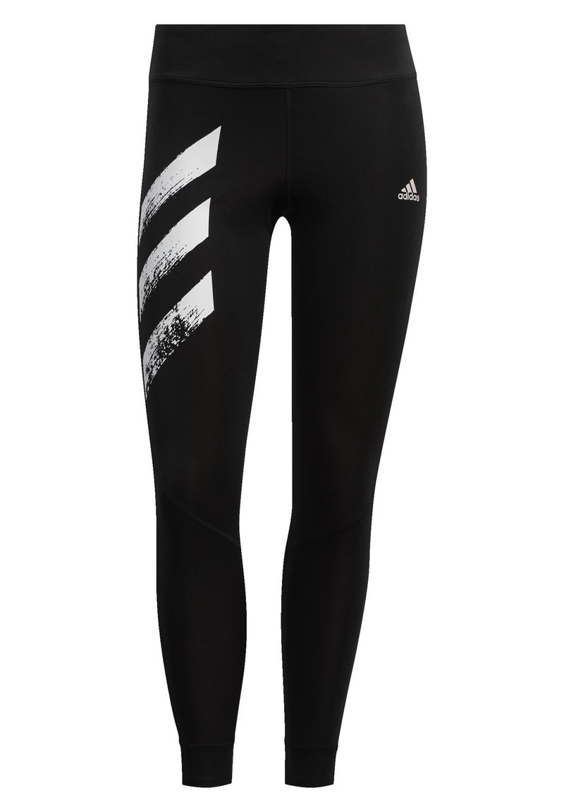 Czarne legginsy wykonane z elastycznego materiału, z białym graficznym wzorem trzech skośnych pasków po lewej stronie oraz logo Adidas na talii.