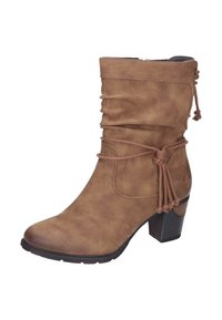 Ruskeat nilkkurit, jotka on valmistettu keinonahasta ja joissa on väljähkö muotoilu. Sidoituminen yksityiskohtana ja paksu, tekstuuroitu korko korostavat mallia.