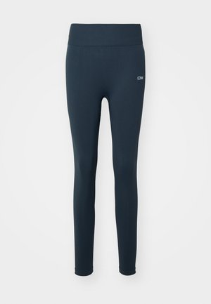 Marine leggings laget av elastisk stoff, med høy midje, jevn tekstur og en liten hvit logo på siden.