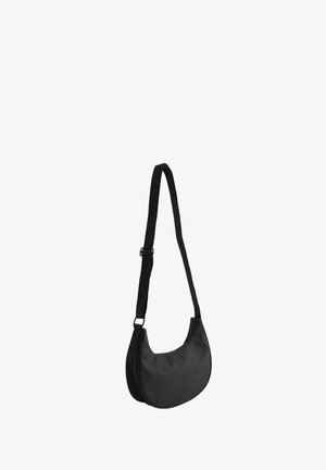 Black nylon shoulder bag with a curved shape, adjustable strap, and smooth texture. Features a minimalistic design and no visible hardware.