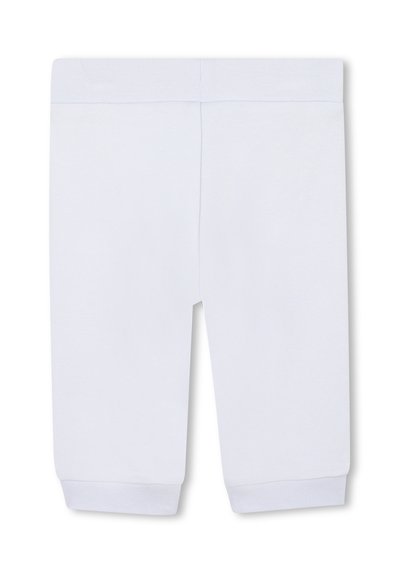 Jasnoniebieskie legginsy bawełniane z elastycznym pasem i żeberkowymi mankietami przy kostkach. Gładka tekstura bez widocznych wzorów czy akcentów.