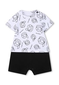 Salopetă cu mâneci scurte, albă, cu imprimeu negru cu față de desen animat, prevăzută cu capse la baza și pantaloni scurți contrastanți negri. Material din bumbac.