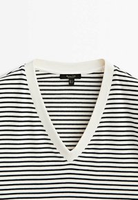 Haut en maille à col en V avec des rayures horizontales noires et blanches et un col côtelé blanc, fabriqué par Massimo Dutti en taille S.