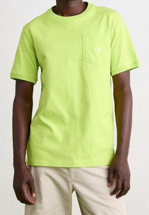 Lime green cotton t-shirt with short sleeves, a crew neck, and a front pocket featuring a small logo accent. Simple and casual design.