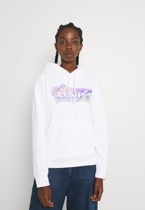 Hvit hettegenser med et frontgrafikk som har "Levi's" i fargerike design. Den har kengurulomme, snor i hetten og ribbede ermer.