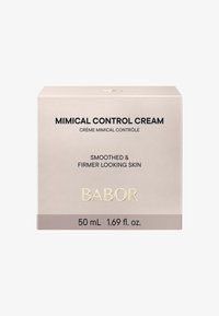 Boîte carrée crème en beige pâle avec texte noir, mettant en avant "Crème de Contrôle Mimical" et le logo "Babor". Contient 50 mL. Finition élégante et mate.