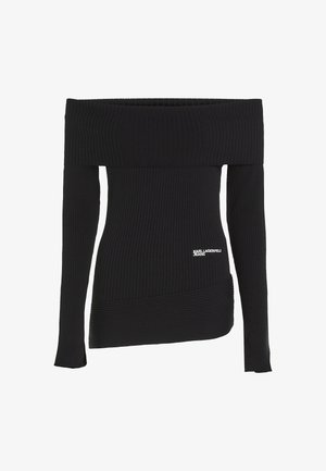 Črn rebrast top brez naramnic z dolgimi rokavi. Ima kontrastno vodoravno teksturo in majhen bel logotip na spodnji strani.