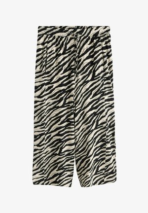 Laiade lõikega lühikesed püksid mustade ja valgete sebratriipudega, elastse vöökohaga ja nöörkinnitusega.