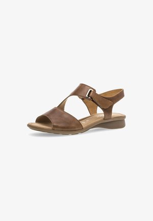 Brown leather sandal with open toe, cross strap design, adjustable buckle, cushioned insole, and low wedge heel. Subtle texture with smooth finish.
