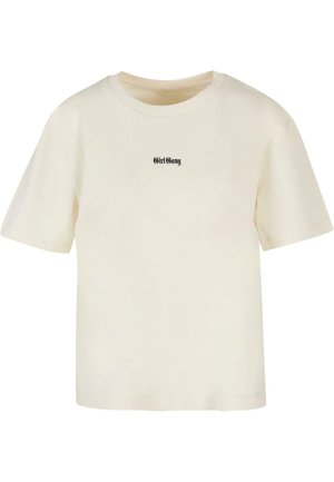 Kermavajane puuvillane T-särk lühikeste varrukatega ja soonikuga ümmarguse kaelusega. Rinnal on musta värviga trükitud "GirlGang."