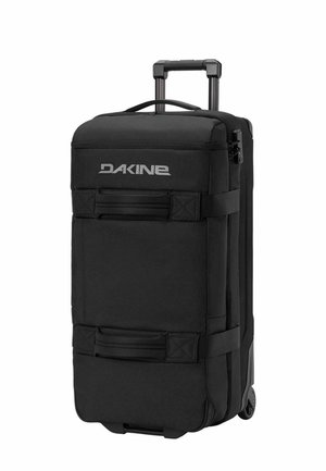 Schwarze Dakine Reisetasche mit Rollen, Teleskopgriff, zwei Tragegriffen und seitlichen Gurten zum Komprimieren oder Tragen.