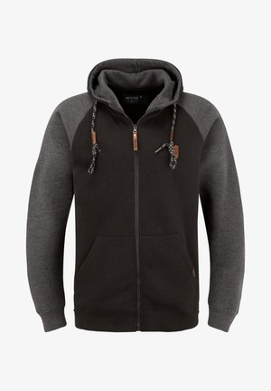 Huvtröja med dragkedja gjord av svart och grått tyg, med fodrad huva, två framfickor och dekorativa snoddar med läderdetaljer.