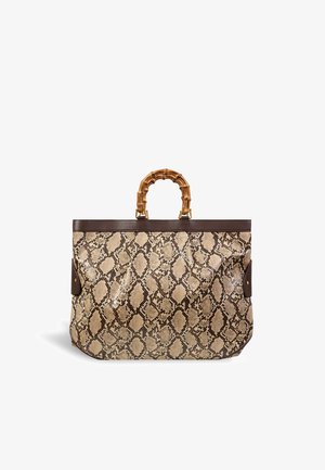 Large tote bag with brown snakeskin pattern, dark brown trim, and a curved bamboo handle on a white background.