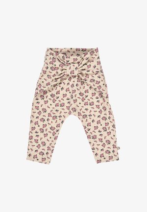 Flower-patterned beige leggings with a bow detail at the waist. Made from soft fabric, featuring small pink and black floral designs.