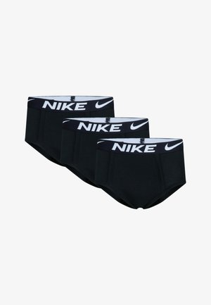 Tres pares de calzoncillos de algodón negro estilo brief con una cinturilla blanca con el logo de Nike. Presentan una textura suave y un diseño ajustado.