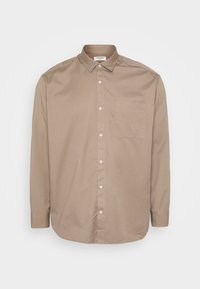 Beige Langarm-Hemd mit Kragen, einer Brusttasche und subtiler Textur. Hergestellt aus leichtem Stoff und mit weißen Knöpfen ausgestattet.
