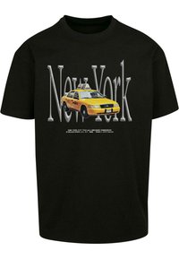 Melna kokvilnas T-kreklu ar dzeltenu Ņujorkas taksometra grafiku un "New York" tekstu pelēkā krāsā. Īsas piedurknes, apaļa kakla izgriezums, ikdienas piegriezums.