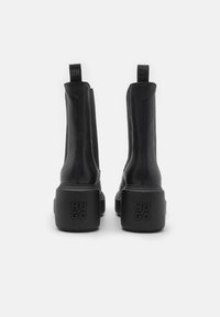 HUGO MEGHAN - Bottines à plateau - black
