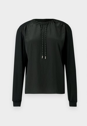 Haut noir à manches longues avec col froncé, détail à cordon de serrage, et tissu contrastant sur les manches. Devant au toucher lisse, coupe décontractée.