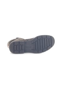 Sole of a dark gray boot showing patterned grip with brand name "Gabor" and size 4 ½ on a white background.