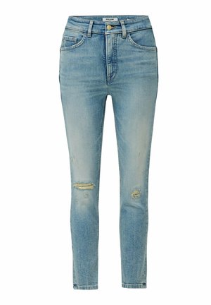 Jean en denim bleu clair avec une taille haute, coupe skinny et détails déchirés, présentant des déchirures et des réparations aux genoux.