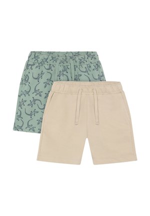 Deux pantalons courts, l'un vert clair avec un imprimé lézard, l'autre beige. Les deux ont une taille élastique et des détails avec un cordon de serrage.