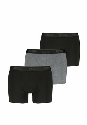Drei Paar Puma Boxershorts in Schwarz und Grau, fächerförmig angeordnet, jeweils mit schwarzem Bund und Puma-Logo.