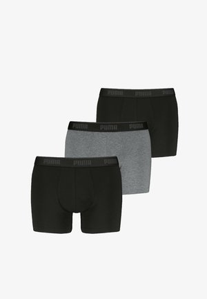 Drei Paar Puma Boxershorts in Schwarz und Grau, fächerförmig angeordnet, jeweils mit schwarzem Bund und Puma-Logo.