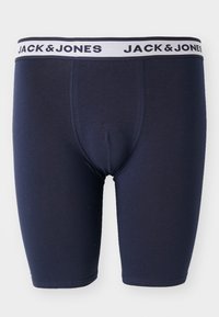 Boxeri elastici de culoare bleumarin, cu un tiv alb contrastant pe care este scris textul "JACK & JONES". Textură fină, design ajustat.