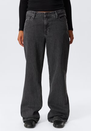 Bredde ben, mørkegrå denimjeans med en teksturert finish, fem lommer, knappelukking og belteholdere. Sømdetaljer langs sømmene.
