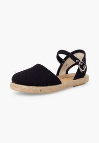 Sandale espadrille noire en toile avec bout fermé, bride de cheville avec boucle argentée et semelle en jute tressée sur fond blanc.