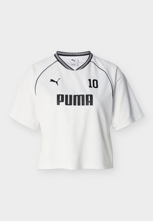 Valkoinen Puma-urheilu paita mustilla reunoilla, numero 10 rinnassa ja Puma-logo oikealla puolella.