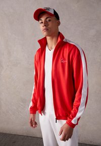 Karl Kani - CHEST SIGNATURE TRACKJACKET - Tréning dzseki - red Miniatűr kép 1