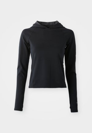 Sudadera negra de manga larga con capucha, hecha de un tejido suave y elástico. Presenta mangas raglán y un diseño ajustado, con un sutil detalle de logo.