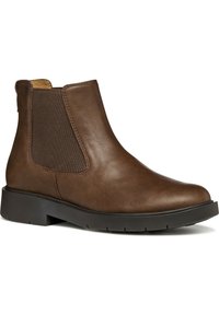 Botas de piel marrón hasta el tobillo con paneles laterales elásticos, puntera redonda, tacón bajo de goma y textura suave. Detalle de costura a lo largo de las costuras.