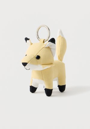 Mažas audinio raktų pakabukas - lapės formos, geltonos spalvos kūnu, juodomis letenėlėmis ir ausytėmis, balta snukučio ir uodegos galiuku, su apvaliomis juodomis akimis.