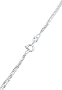 Smykkesølv kæde halskæde med et delikat dobbelte-link design. Udstyret med en rund lobster clasp mærket "925." Glat, skinnende tekstur.