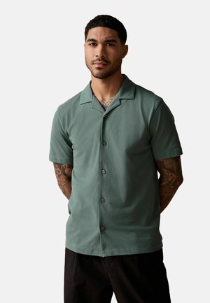 Next Polosärk - mineral green